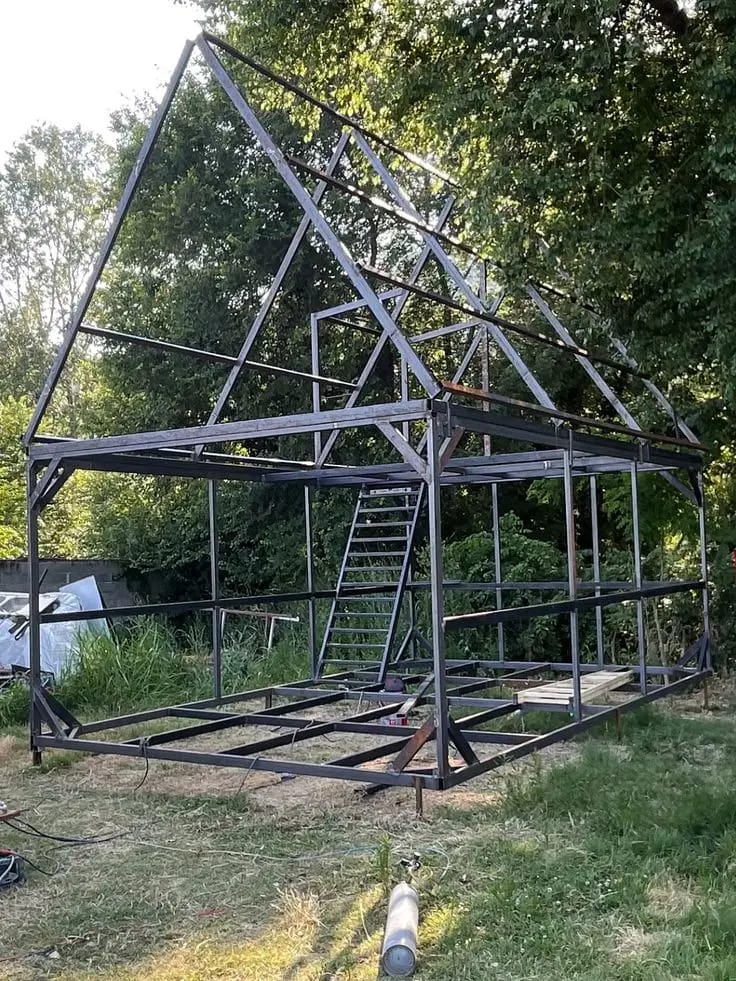 Steel skeleton of an A-frame home under construction