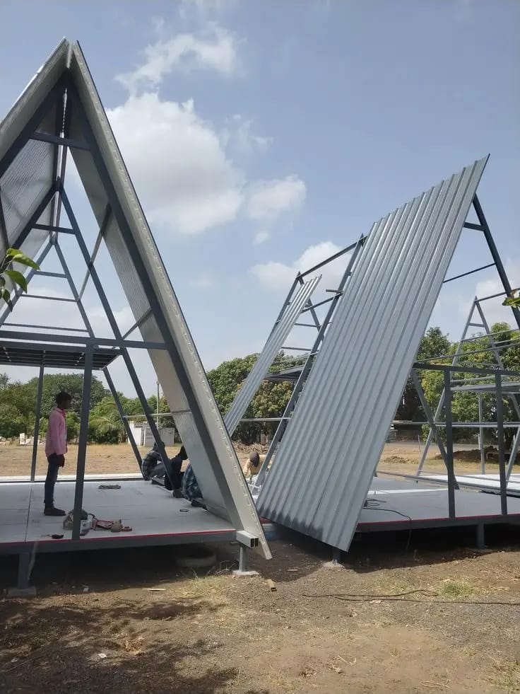 Steel A-frame structure being installed on site